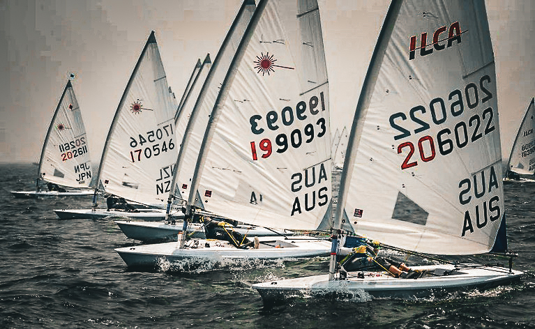 A club fleet on the water